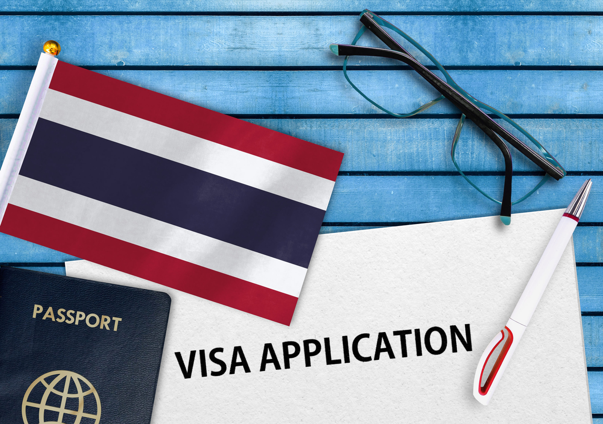 Visa application form and flag of Thailand